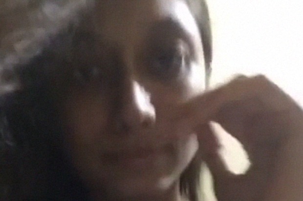 Cute Indian babe removing her top to expose boobs