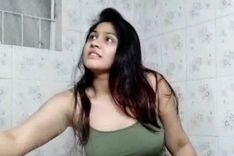 Wet sexy boobed desi girl in green top dancing in the bath